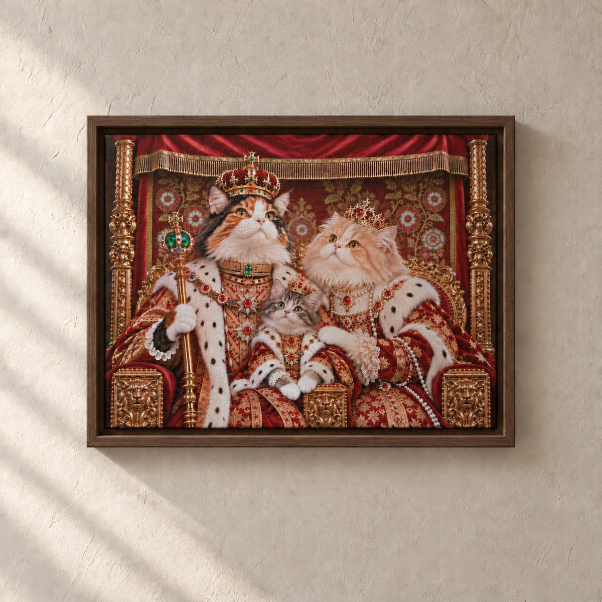 Royal cat portrait canvas, 3 cats, 16" x 12", Brown frame, on a plaster wall