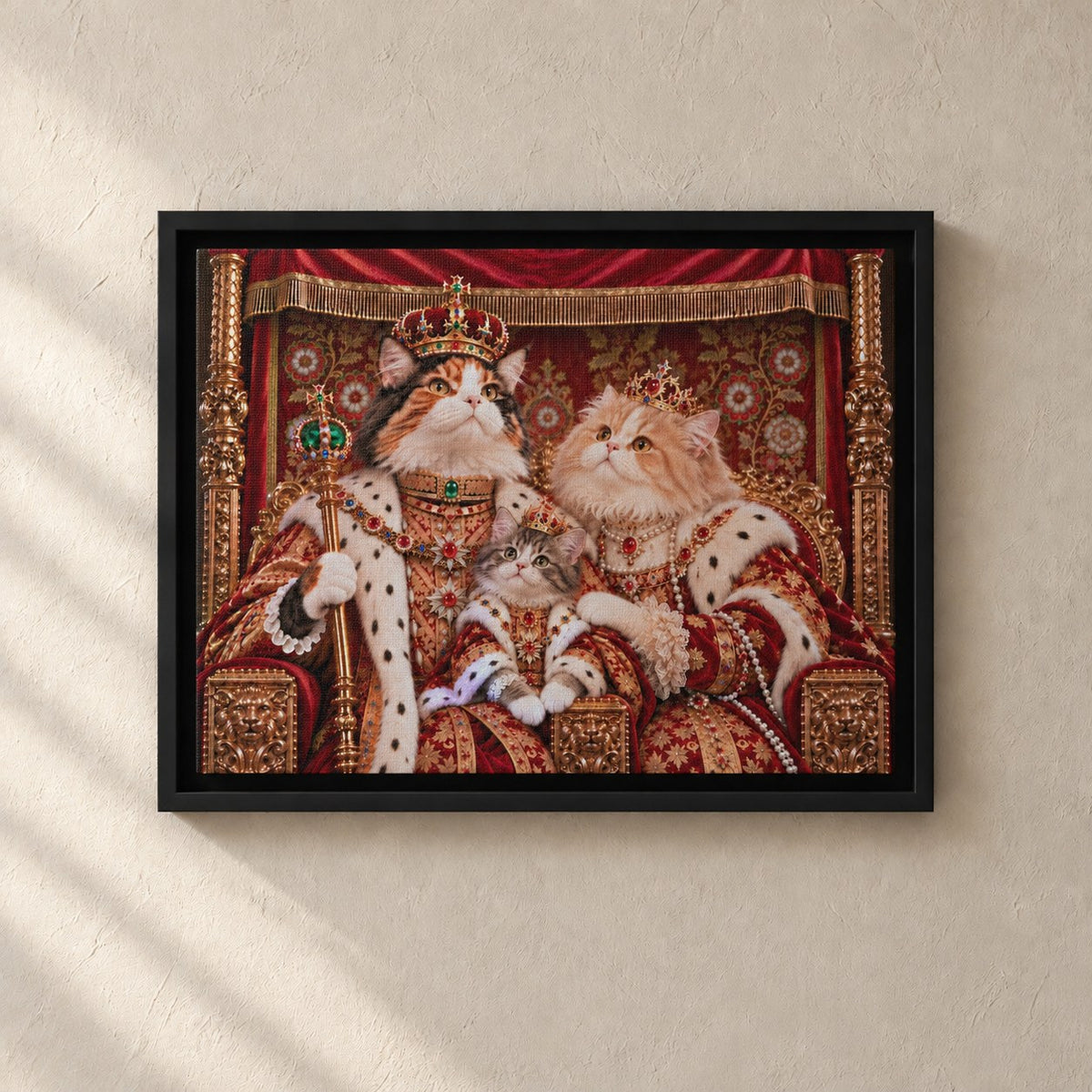 Royal cat portrait canvas, 3 cats, 16" x 12", Black frame, on a plaster wall